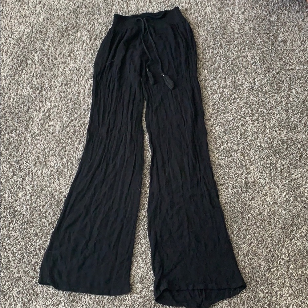 Black side leg pants, with tassels